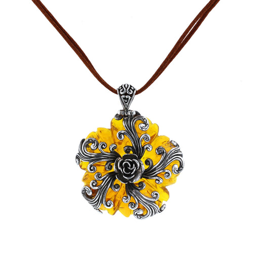Sterling Silver Wrapped Carved Amber Flower Pendant